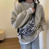 Sac Banane Zèbre – Modèle Tendance & Pratique | sac-banane.net